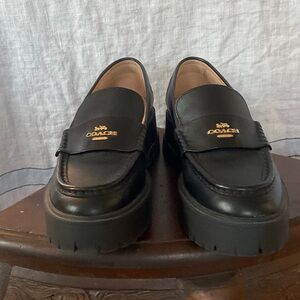 Coach women's Black Leather Lug Sole Platform Loafer